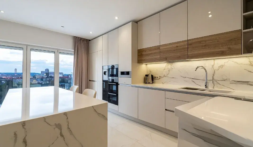 Bright modern kitchen with clean counters contributing to an allergen free home.